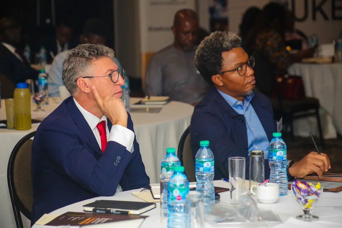 Executive delegates in conversation